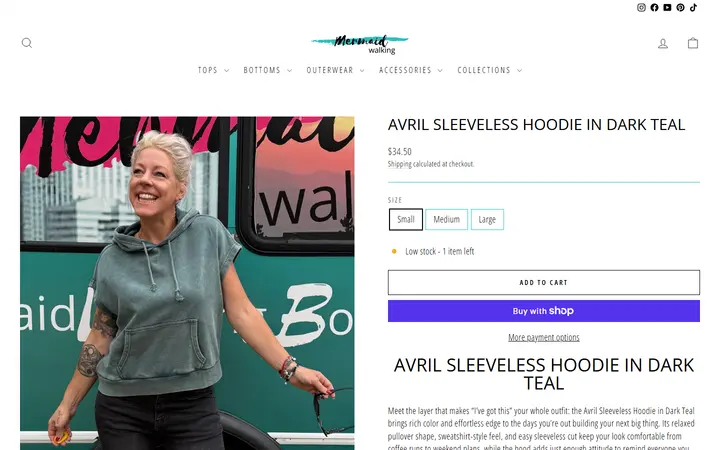 /collections/new-arrivals/products/avril-sleeveless-hoodie-in-dark-teal — Mermaid Walking Boutique
