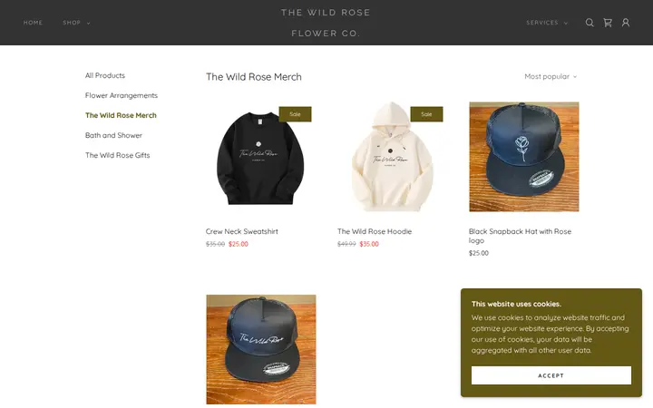 /the-wild-rose-store/ols/categories/merch — The Wild Rose Flower Co.